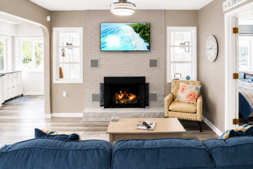 Living room with 'push button' lake fireplace