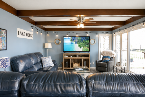 75 inch flat-screen TV with plenty of seating