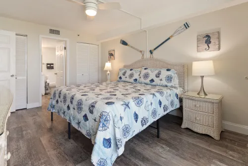 Spacious double bedroom with a king-size bed and closet space