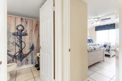 Second bedroom along with second bathroom located next to each other off the kitchen