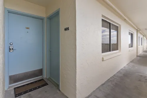Front doors to Sancastle—one unit—605 with an electronic coded lock 