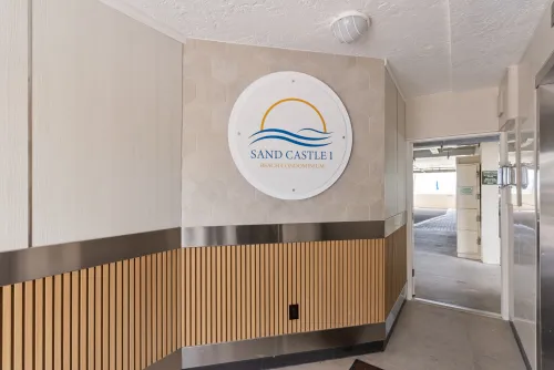 Entrance way to elevators, beach, gas grills, heated pool &amp; hot tub