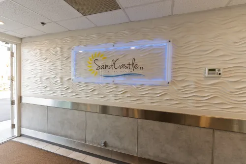 Entrance way to elevators, oceanfront access to heated pool, hot tub, and gas grills 