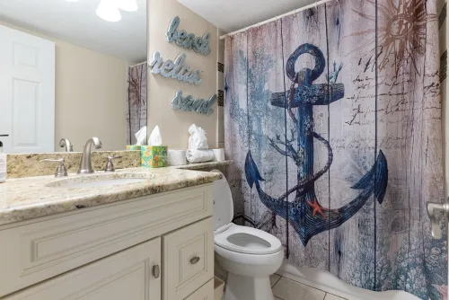 The second bathroom includes a bathtub and shower just adjacent to bedroom 2 and bedroom 3