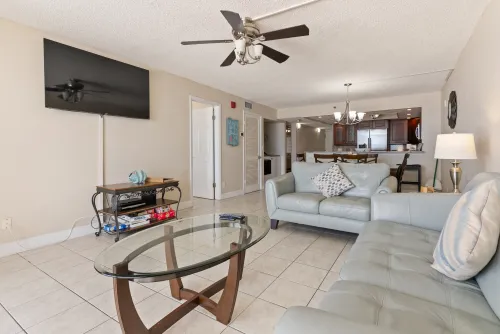 Living room with flat-screen TV and plenty of seating 
