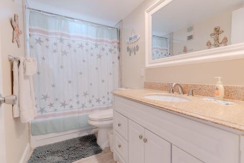Second bathroom with shower located adjacent to the second bedroom