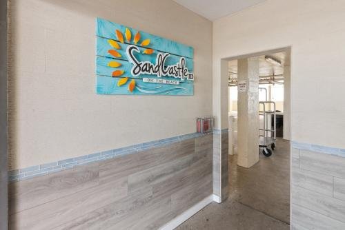 Elevator entranceway direct access through parking lot to pool area, gas grills and ocean access